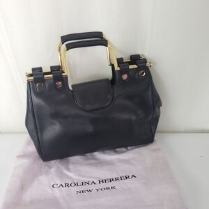 Carolina Herrera black leather hard handle gold metal handbag